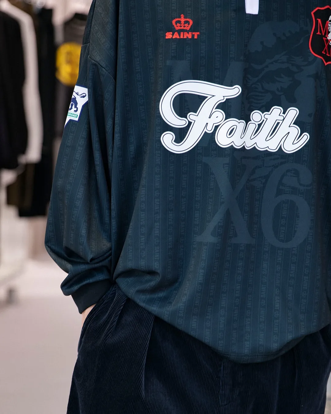 SAINT M×××××× SOCCER SHIRT 'FAITH'/BLK FAITH Football Long Sleeve Black S-XL This design has a lot of craftsmanship Digital fabric printing/front positioning printing laser cutting Offset printing + flocking printing + embossing Imported Behringer machine embroidery Flat machine collar + cuffs Genuine consistent main mark/wash mark/cherub mark